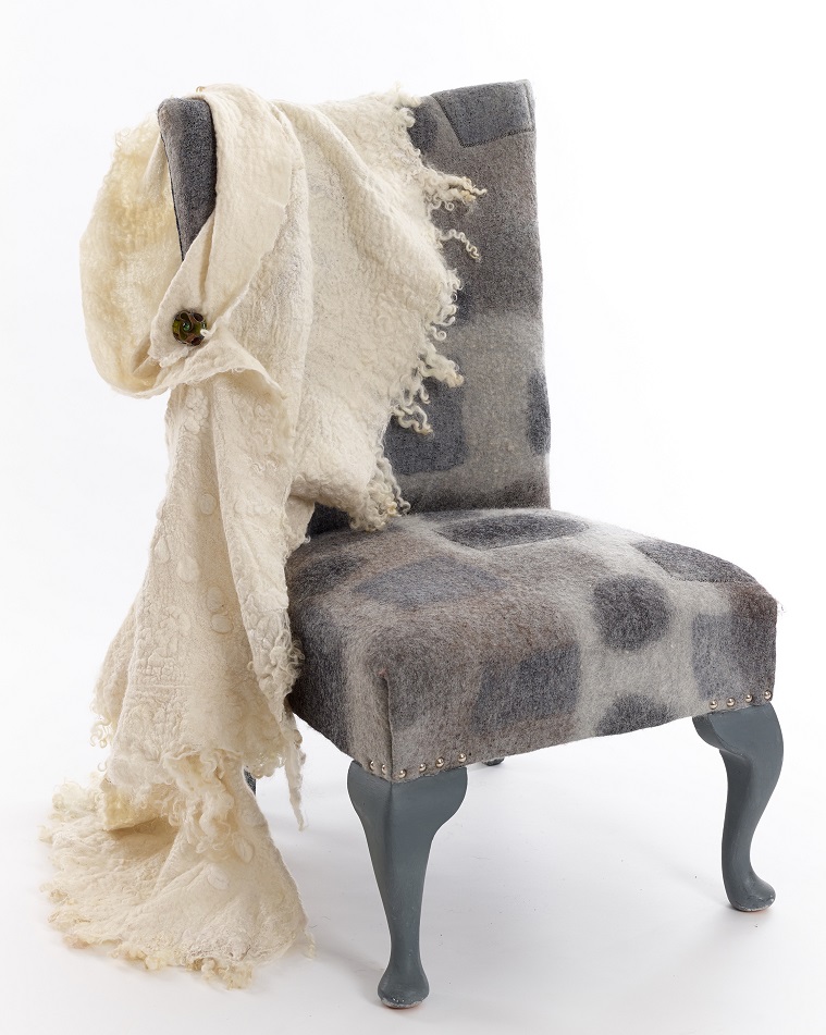 Felt chair with felt shawl draped over the back - both made by Pearl Taylor